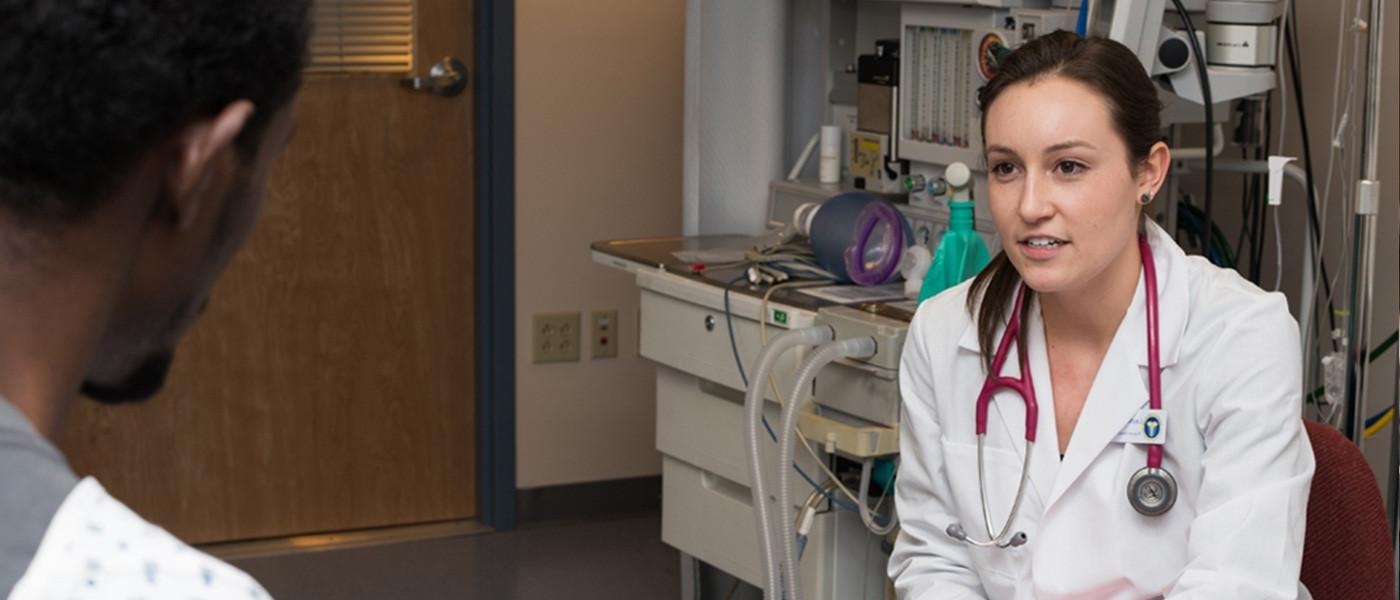 Physician Assistant degree program student providing clinical care.